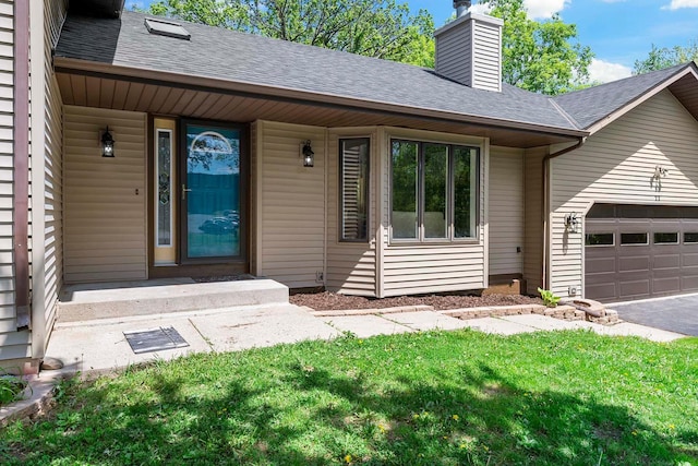 77 Emerson Ave W, West Saint Paul, MN 55118 - property entrance with an attached garage, a shingled roof, a chimney, and asphalt driveway