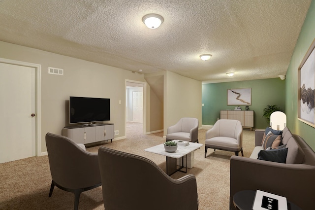 2714 18th Ave S, Minneapolis, MN 55407 - living room featuring carpet floors and a textured ceiling