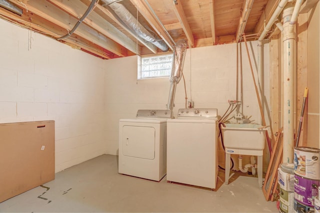 2714 18th Ave S, Minneapolis, MN 55407 - washroom with washing machine and dryer and concrete block wall