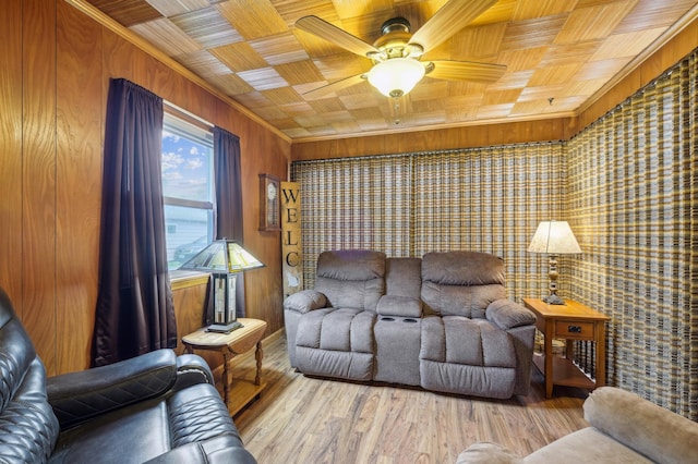 1224 Grotto St N, Saint Paul, MN 55117 - living area with ceiling fan, wooden walls, wood finished floors, ornamental molding, and wood ceiling