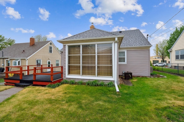 1224 Grotto St N, Saint Paul, MN 55117 - rear view of property featuring a deck and a shingled roof
