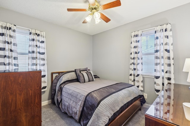 1224 Grotto St N, Saint Paul, MN 55117 - bedroom featuring carpet, baseboards, and ceiling fan