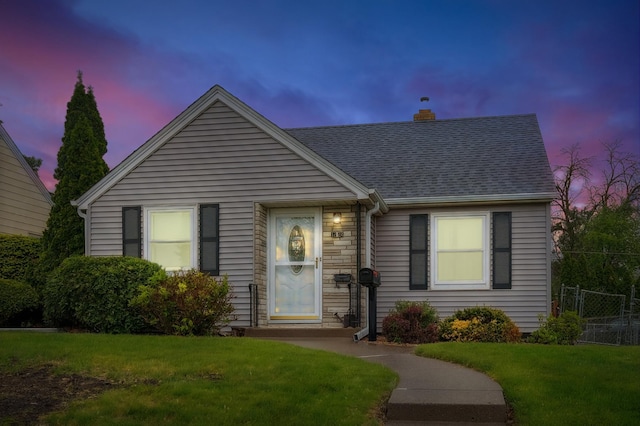 1224 Grotto St N, Saint Paul, MN 55117 - bungalow-style home featuring a chimney and roof with shingles