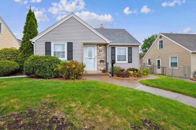 1224 Grotto St N, Saint Paul, MN 55117 - bungalow featuring roof with shingles and a chimney
