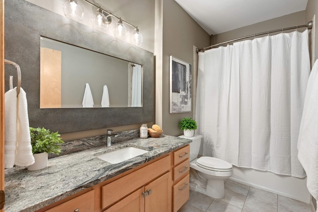 full bath featuring tile patterned floors, vanity, toilet, and shower / bath combo with shower curtain