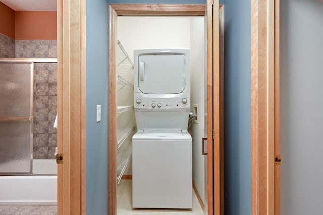 laundry room featuring stacked washer / dryer