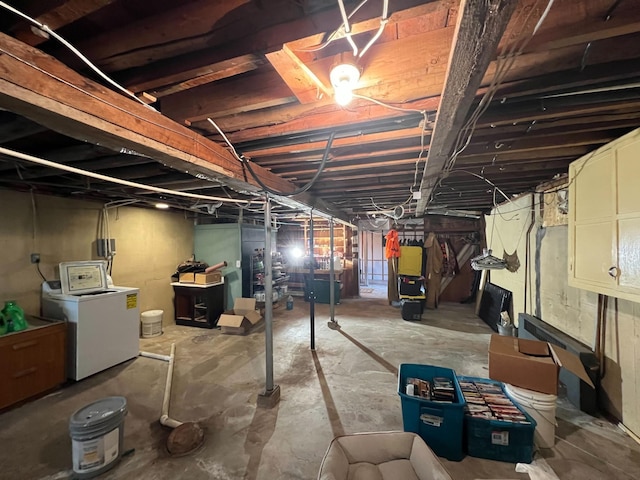 225 State St, Buhl, MN 55713 - unfinished below grade area with washer / clothes dryer