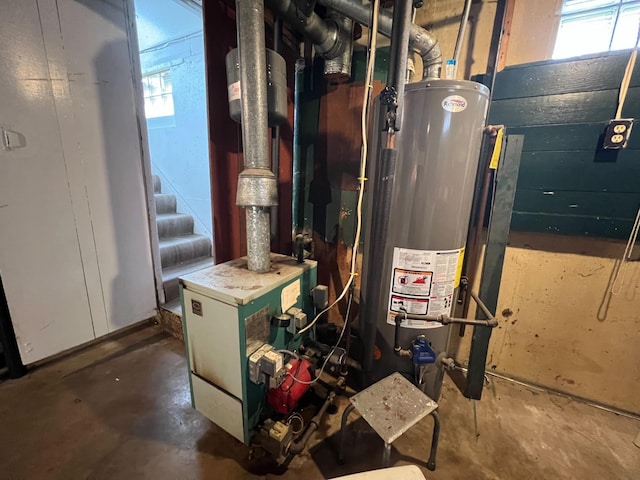 225 State St, Buhl, MN 55713 - utilities featuring gas water heater and a heating unit