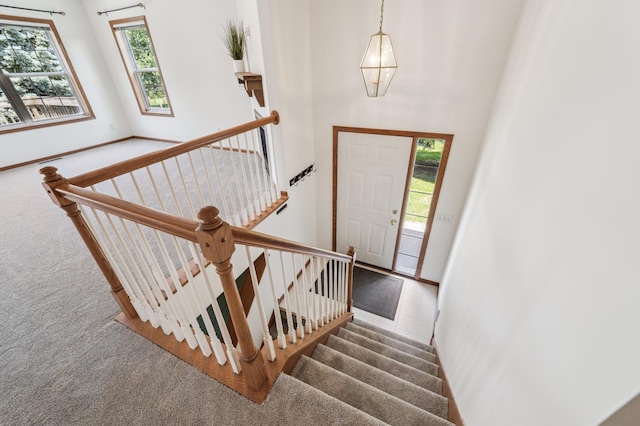 7379 Devin Ln, Shakopee, MN 55379 - foyer entrance featuring carpet floors and baseboards