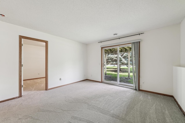 7379 Devin Ln, Shakopee, MN 55379 - carpeted empty room with a textured ceiling and baseboards