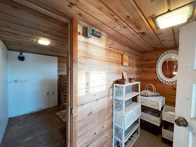 6565 White Pine Ln, Biwabik Twp, MN 55741 - sauna / steam room featuring wooden walls, concrete flooring, and wood ceiling