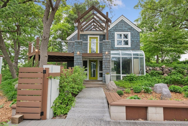 5016 Shady Oak Rd S, Minnetonka, MN 55343 - view of front facade with a balcony and a gate