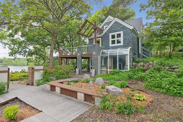 5016 Shady Oak Rd S, Minnetonka, MN 55343 - rear view of property featuring a sunroom and a deck with water view