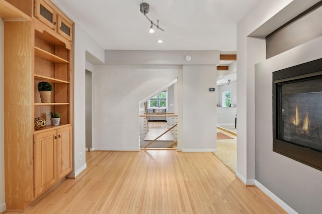 5016 Shady Oak Rd S, Minnetonka, MN 55343 - hall featuring light wood-style flooring and baseboards