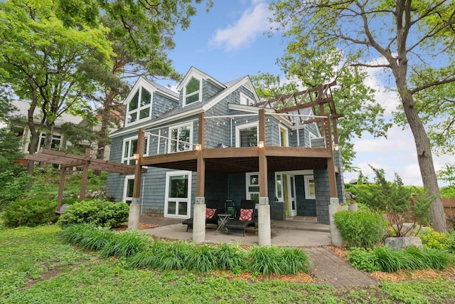 5016 Shady Oak Rd S, Minnetonka, MN 55343 - back of house with a pergola, a wooden deck, and a patio