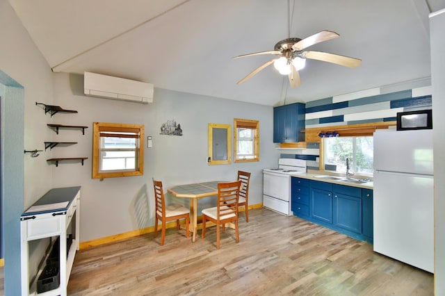 20996 County 96, Little Sauk Twp, MN 56378 - kitchen with white appliances, blue cabinets, a sink, an AC wall unit, and light wood finished floors