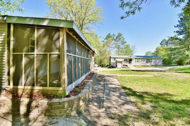 20996 County 96, Little Sauk Twp, MN 56378 - view of property exterior with a sunroom and a lawn
