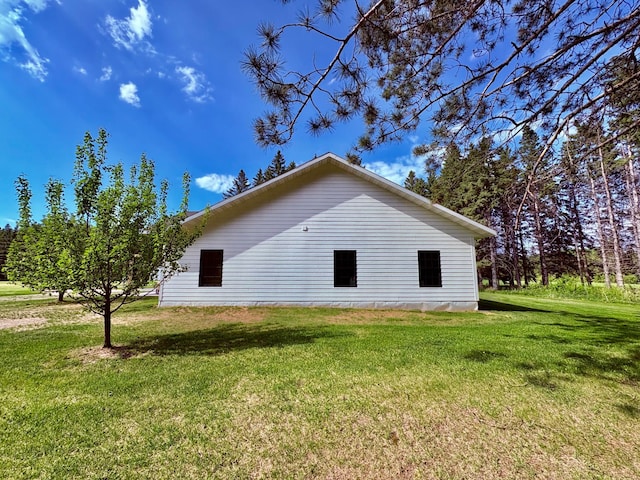 1622 82nd Ave NW, Williams, MN 56686 - view of side of home with a lawn