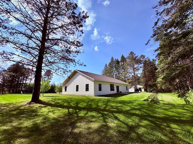1622 82nd Ave NW, Williams, MN 56686 - view of side of home featuring a lawn