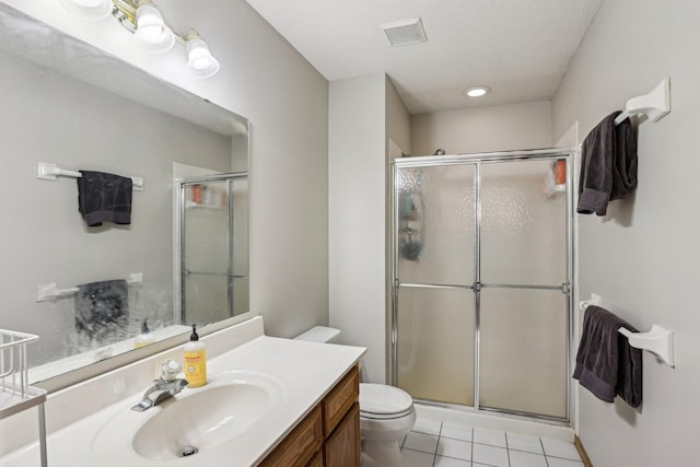 16905 Jalisco Ter W, Lakeville, MN 55044 - bathroom featuring vanity, a stall shower, tile patterned flooring, and recessed lighting
