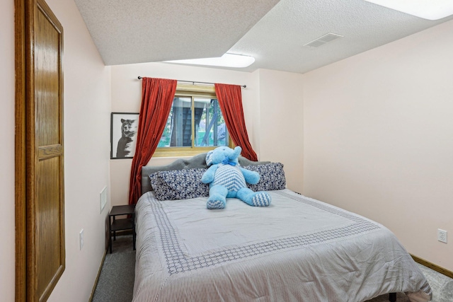 16905 Jalisco Ter W, Lakeville, MN 55044 - carpeted bedroom featuring a textured ceiling and baseboards