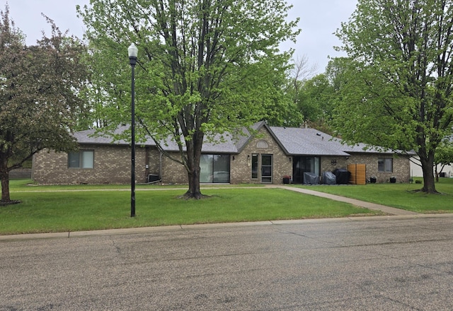 1841 Kemberidge Rd, Detroit Lakes, MN 56501 - view of front of property featuring a front yard and brick siding