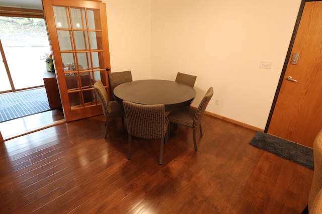 1841 Kemberidge Rd, Detroit Lakes, MN 56501 - dining space with dark wood-type flooring and baseboards