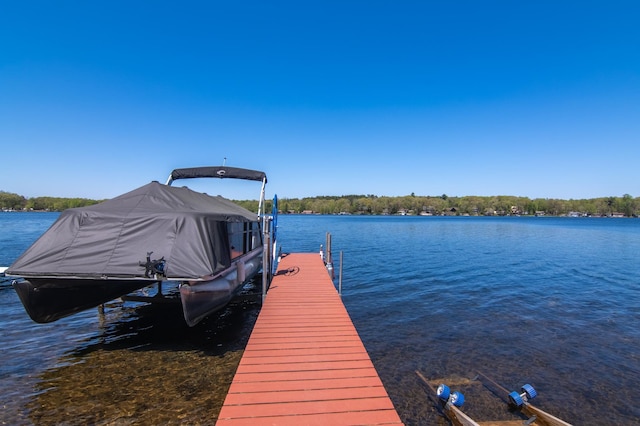601 Idlewild St Unit 102, Balsam Lake, WI 54810 - dock with a water view and boat lift