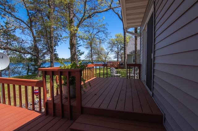 601 Idlewild St Unit 102, Balsam Lake, WI 54810 - wooden deck with a water view