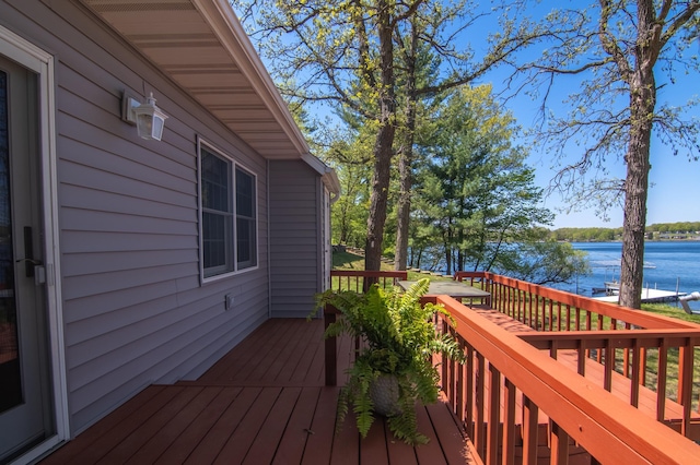 601 Idlewild St Unit 102, Balsam Lake, WI 54810 - wooden terrace with a water view