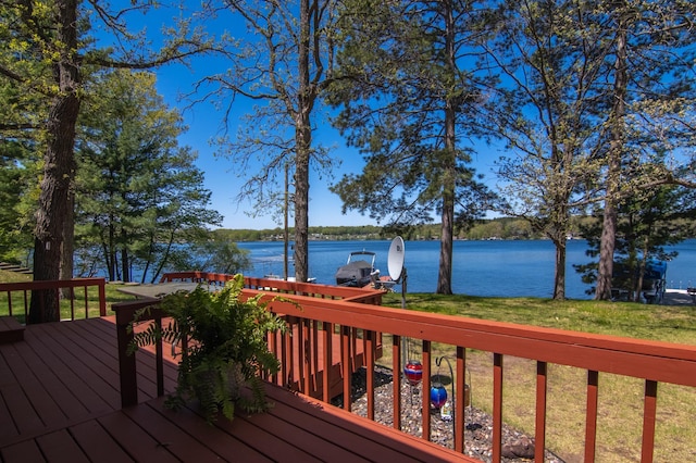601 Idlewild St Unit 102, Balsam Lake, WI 54810 - wooden deck featuring a water view and a lawn