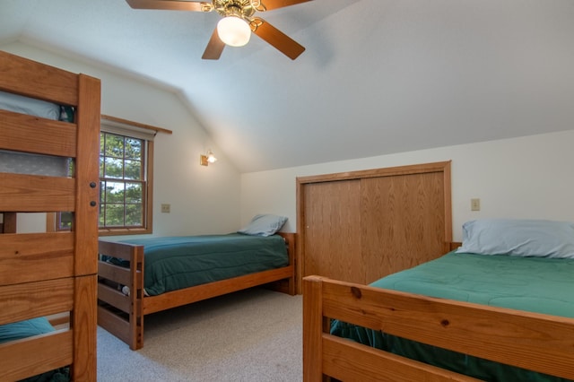 601 Idlewild St Unit 102, Balsam Lake, WI 54810 - carpeted bedroom with vaulted ceiling, a closet, and a ceiling fan