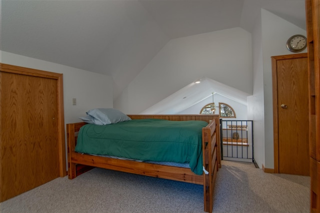 601 Idlewild St Unit 102, Balsam Lake, WI 54810 - carpeted bedroom featuring vaulted ceiling