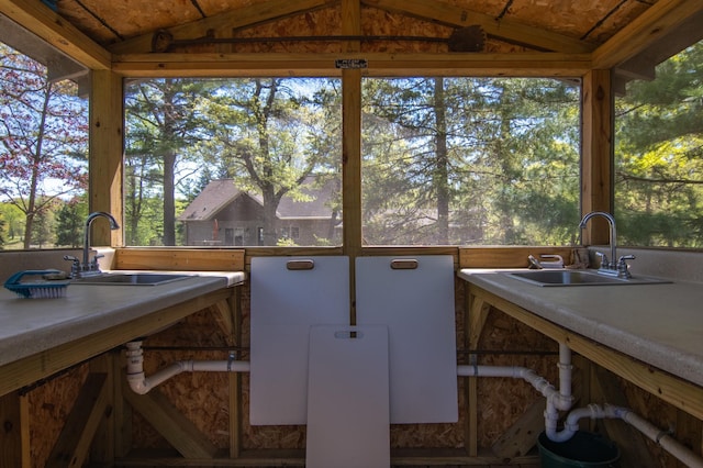 601 Idlewild St Unit 102, Balsam Lake, WI 54810 - sunroom featuring a sink and lofted ceiling