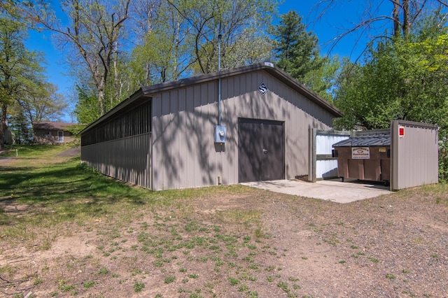 601 Idlewild St Unit 102, Balsam Lake, WI 54810 - view of outbuilding with an outdoor structure and driveway
