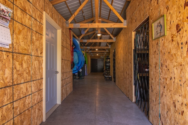 601 Idlewild St Unit 102, Balsam Lake, WI 54810 - hall with concrete floors and vaulted ceiling
