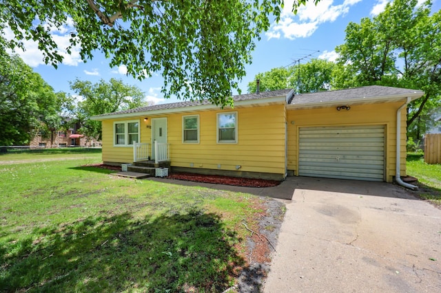 1402 7th St N, Saint Cloud, MN 56303 - view of front of home with a front lawn, driveway, and an attached garage