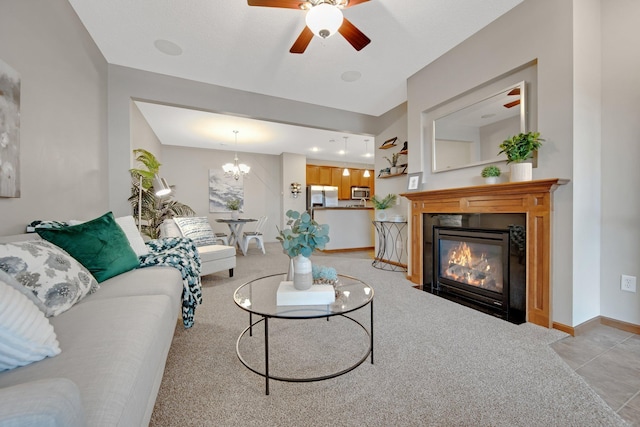 3314 Hazel Trl Unit G, Woodbury, MN 55129 - living room with ceiling fan, a fireplace with flush hearth, light colored carpet, and baseboards