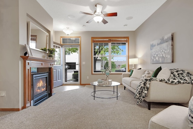 3314 Hazel Trl Unit G, Woodbury, MN 55129 - living room with carpet, baseboards, a glass covered fireplace, and ceiling fan