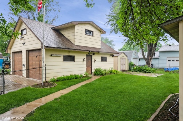 718 Atwood St S, Shakopee, MN 55379 - bungalow-style house featuring a shingled roof and a detached garage