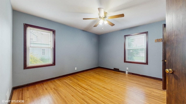 718 Atwood St S, Shakopee, MN 55379 - unfurnished room with light wood-type flooring, baseboards, and ceiling fan