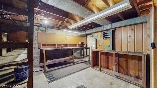 718 Atwood St S, Shakopee, MN 55379 - unfinished basement with a workshop area