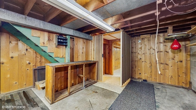 718 Atwood St S, Shakopee, MN 55379 - unfinished basement featuring wood walls and a bar