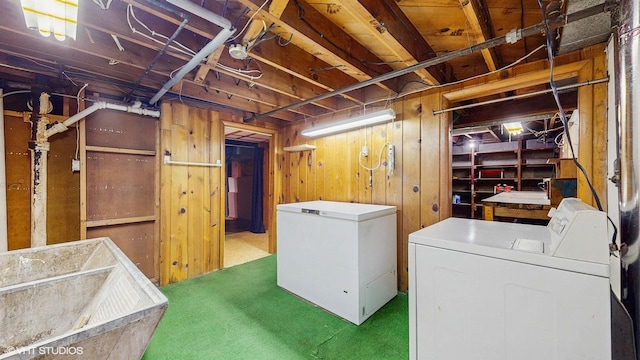 718 Atwood St S, Shakopee, MN 55379 - unfinished below grade area featuring white refrigerator, independent washer and dryer, carpet floors, a sink, and wooden walls