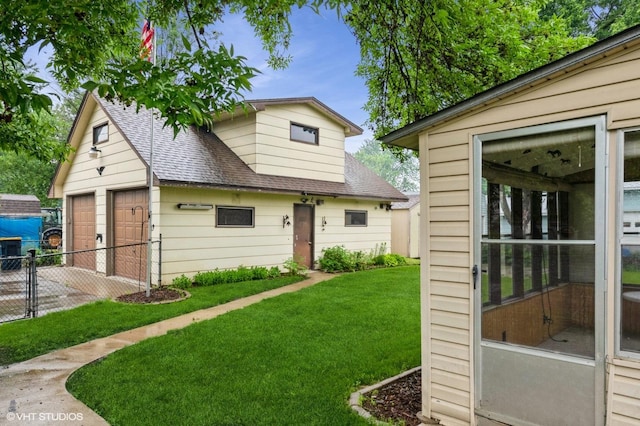 718 Atwood St S, Shakopee, MN 55379 - bungalow-style home featuring roof with shingles and a detached garage