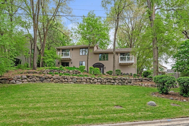5401 Mount Normandale Dr, Bloomington, MN 55437 - view of front of home with a balcony and a front yard