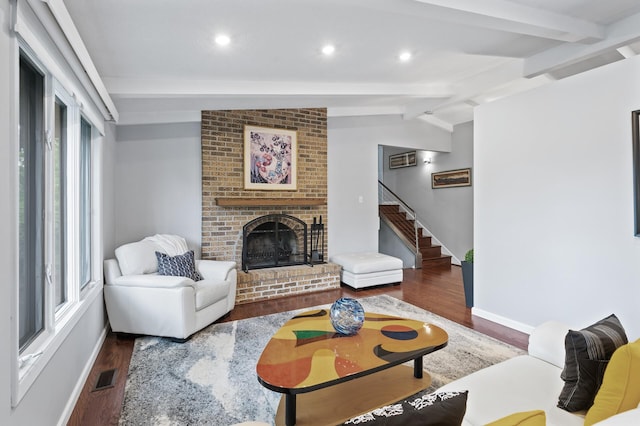 5401 Mount Normandale Dr, Bloomington, MN 55437 - living room with wood finished floors, baseboards, a brick fireplace, stairs, and recessed lighting