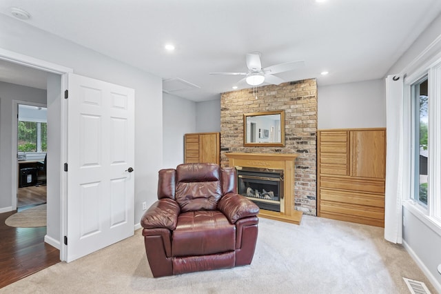 5401 Mount Normandale Dr, Bloomington, MN 55437 - living area with a ceiling fan, recessed lighting, carpet flooring, a brick fireplace, and baseboards