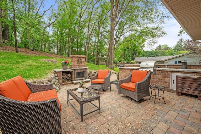 5401 Mount Normandale Dr, Bloomington, MN 55437 - view of patio with an outdoor living space with a fireplace