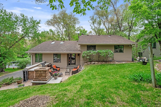 5401 Mount Normandale Dr, Bloomington, MN 55437 - back of house with a patio area, a yard, and a shingled roof